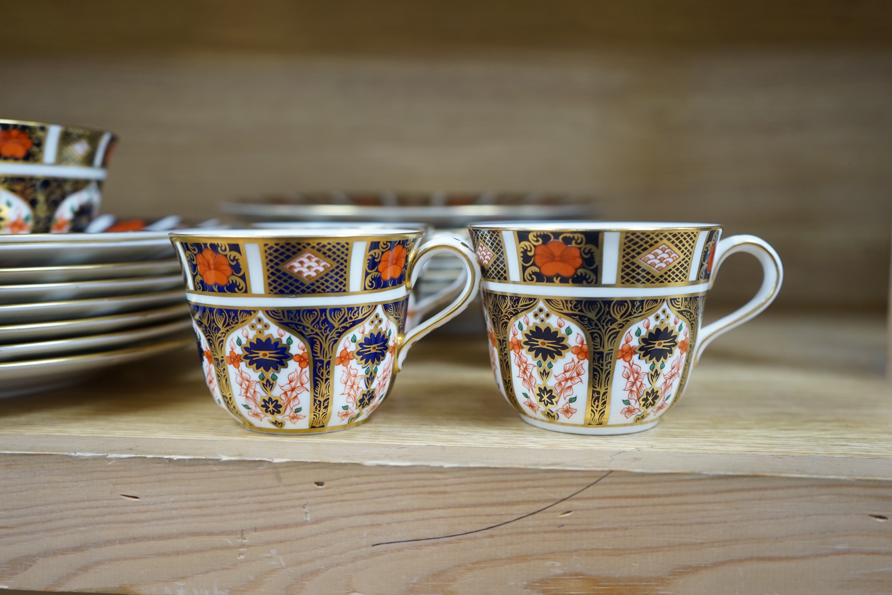 Royal Crown Derby Imari dinner and tea ware, 1128 pattern together with other patterns, comprising dinner plates, side plates, tea cups and saucers, small dishes, etc. Condition - good.